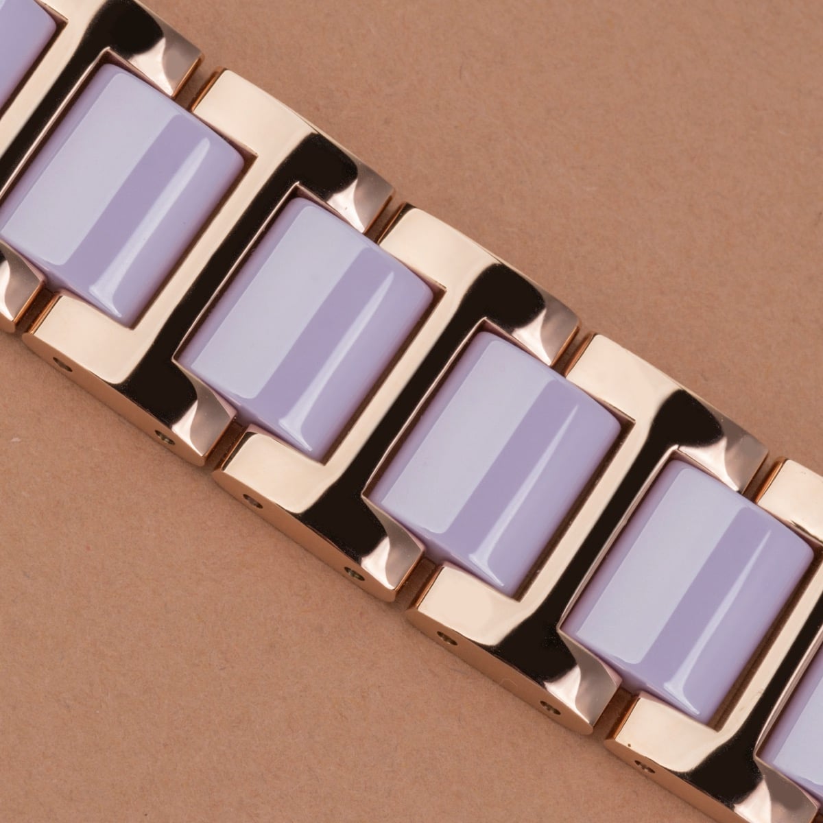 "Kaleidoscopic" bracelet with amethyst and ceramic accents, showcasing a sleek, modern style.