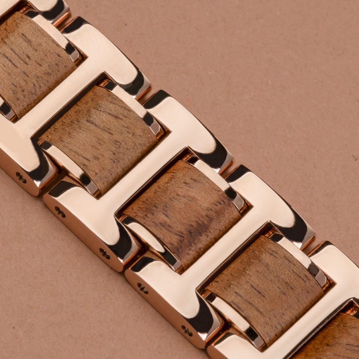 "Kaleidoscopic" bracelet featuring a blend of nacre and koa materials with a sleek, geometric design.