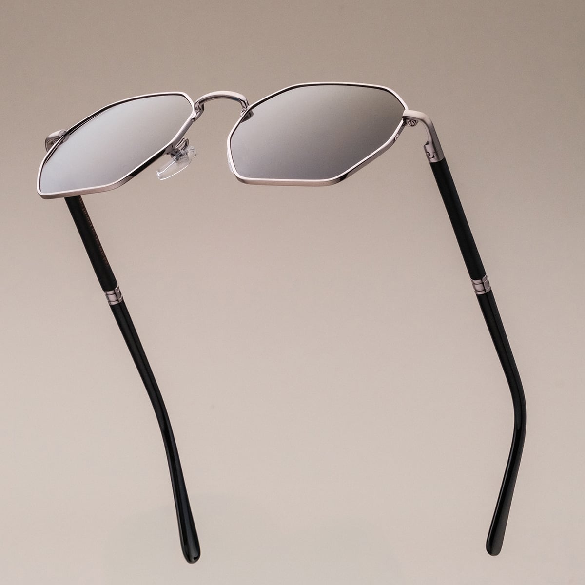 "The Magical", sunglasses with a modern hexagonal design, featuring a Maple/Antique Silver finish.