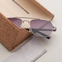 "The Professor" sunglasses in walnut and antique silver with a sleek rectangle design.