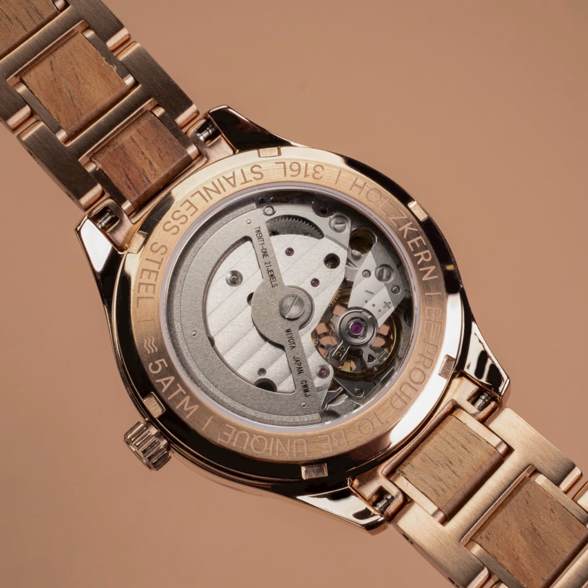 "Kaleidoscopic" watch with an intricate mechanical design and rich wood accents.