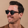 "The Comedian" sunglasses, featuring a sleek Leadwood and Khaki Dust design for a stylish look.