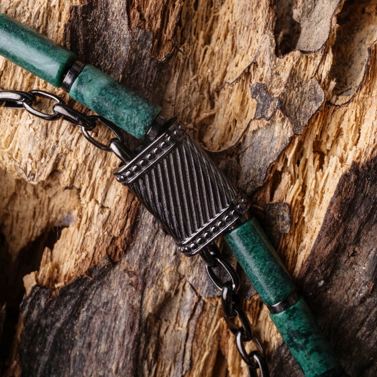 "Supersonic", a stylish aventurine and gray chain bracelet with rustic texture.