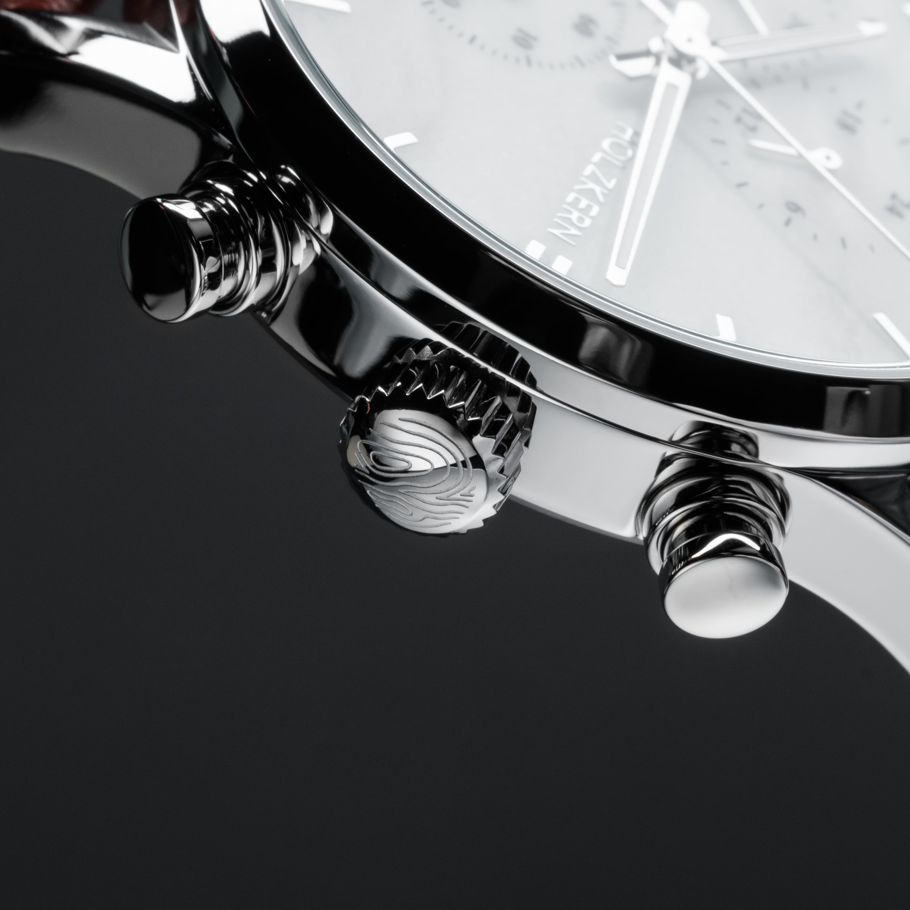 "Melodical" watch featuring a marble and silver design with a sleek, polished finish.