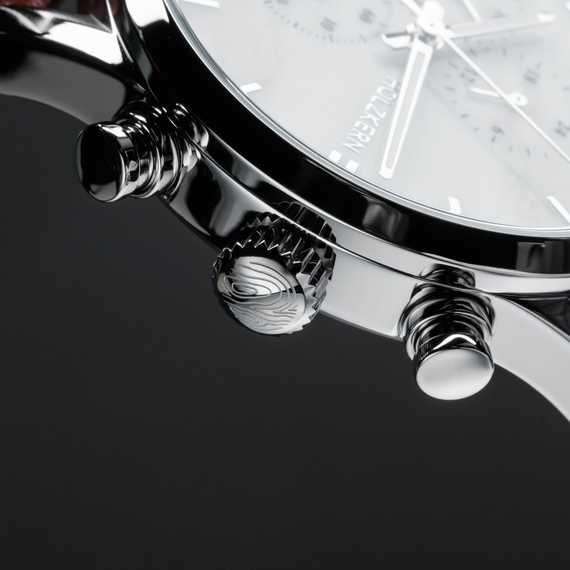 "Melodical" watch featuring a marble and silver design with a sleek, polished finish.