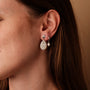 Summersweet earrings featuring baroque pearls and silver, showcasing an elegant and stylish design.