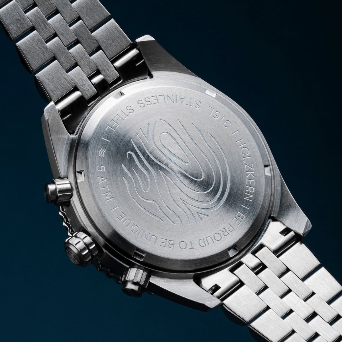 "Openhorizon", elegant watch with blue marble and silver accents, showcasing a detailed stainless steel back.