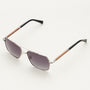 "The Professor" sunglasses featuring a walnut and antique silver finish with a sleek, modern design.