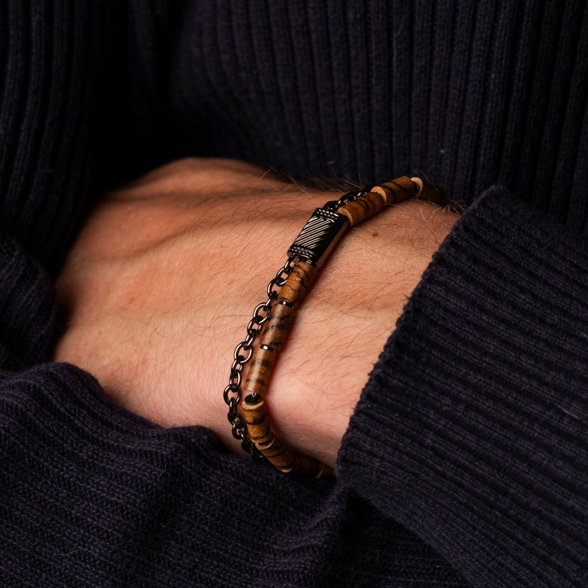 "Supersonic" bracelet featuring zebrawood and gray accents with a stylish chain design.