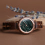 Euterpe watch with Walnut band and marble face, featuring an elegant and natural design.