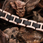 "Acoustic" bracelet with maple and rose gold finishes, featuring a rustic wood-inspired style.