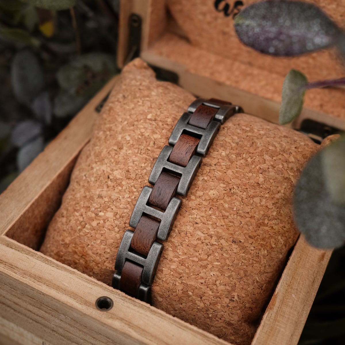"Acoustic" bracelet featuring walnut and antique silver accents in a stylish, rustic design.
