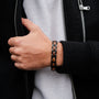 "Acoustic" bracelet in zebrawood and black, featuring a sleek and modern design.