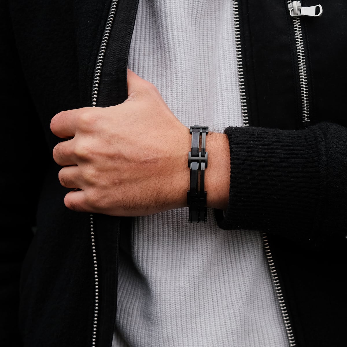 "Staccato", a stylish bracelet featuring a mix of maple and black materials, worn with casual attire.