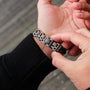 "Staccato" bracelet featuring a stylish combination of walnut and antique silver tones.