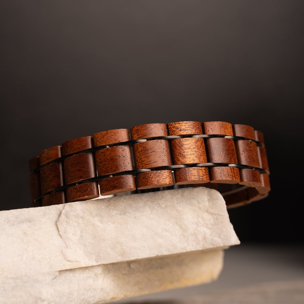 "Grandezza wooden bracelet featuring a mahogany and gray design for a stylish, rustic look."