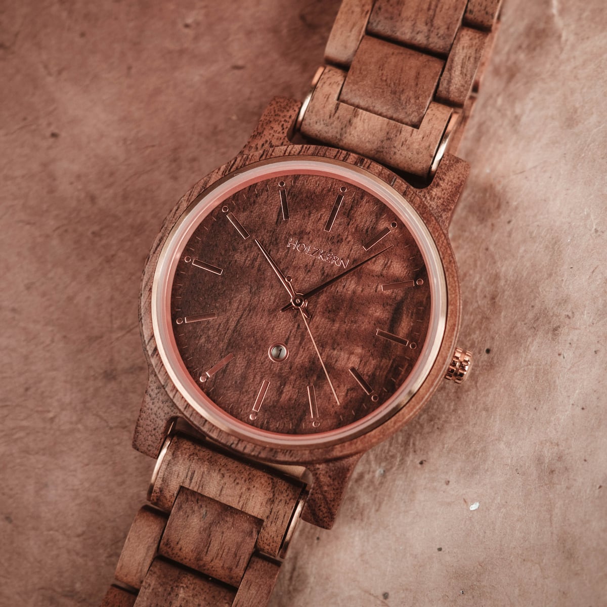 "Hesse" wood watch featuring a rich walnut tone and elegant design.