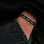 "Allegro" bracelet featuring a sleek, modern design with maple and silver accents.