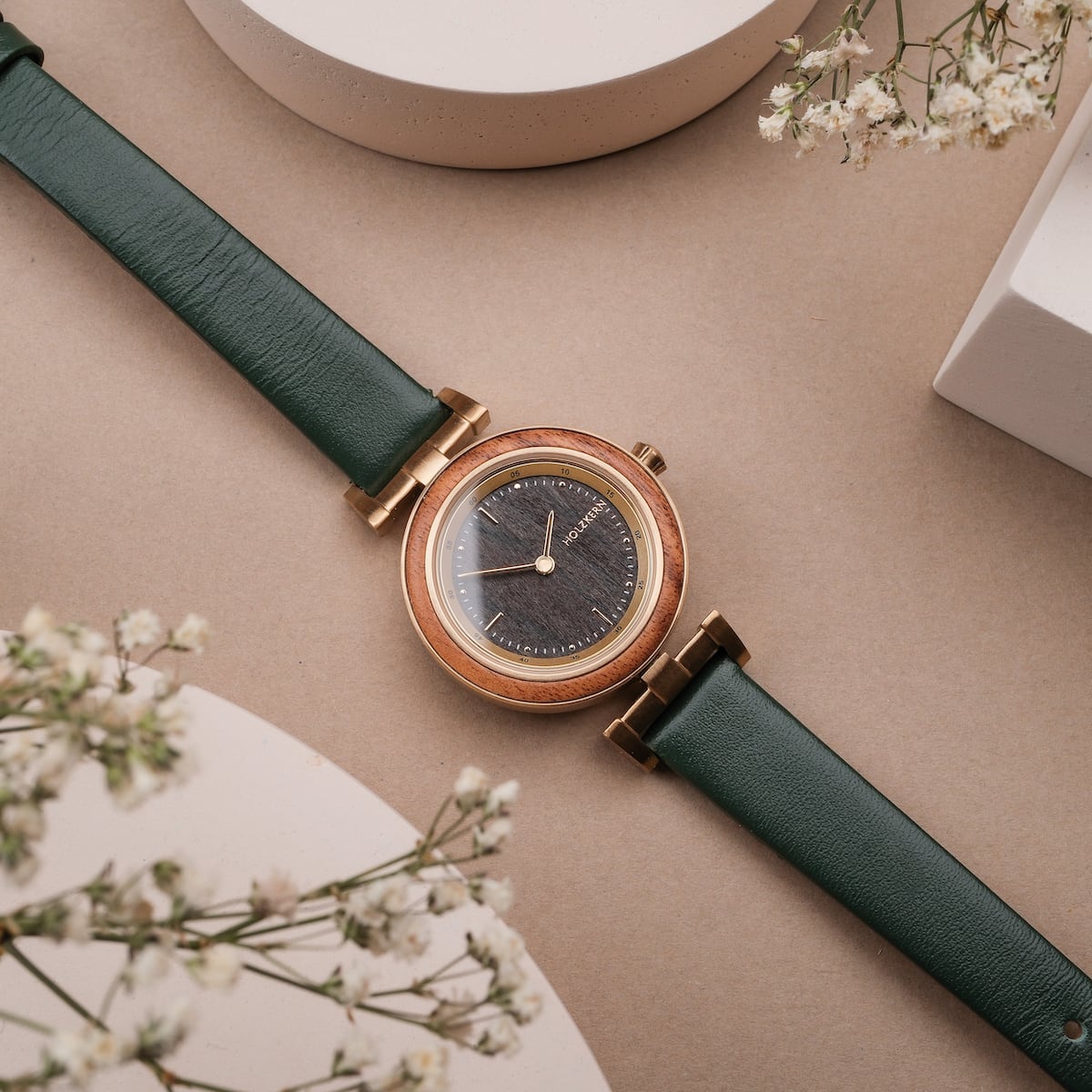 "Amelia" watch with a Marblewood and Maple finish, featuring a green leather strap and elegant minimalist design.