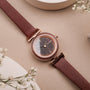 "Harriet", a stylish wristwatch featuring a walnut and maple design with a sleek, elegant look.
