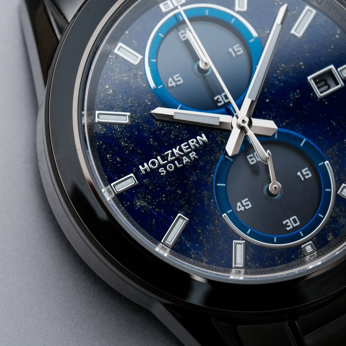 "Uplift" watch features a blue and silver style with chronograph dials and elegant details.