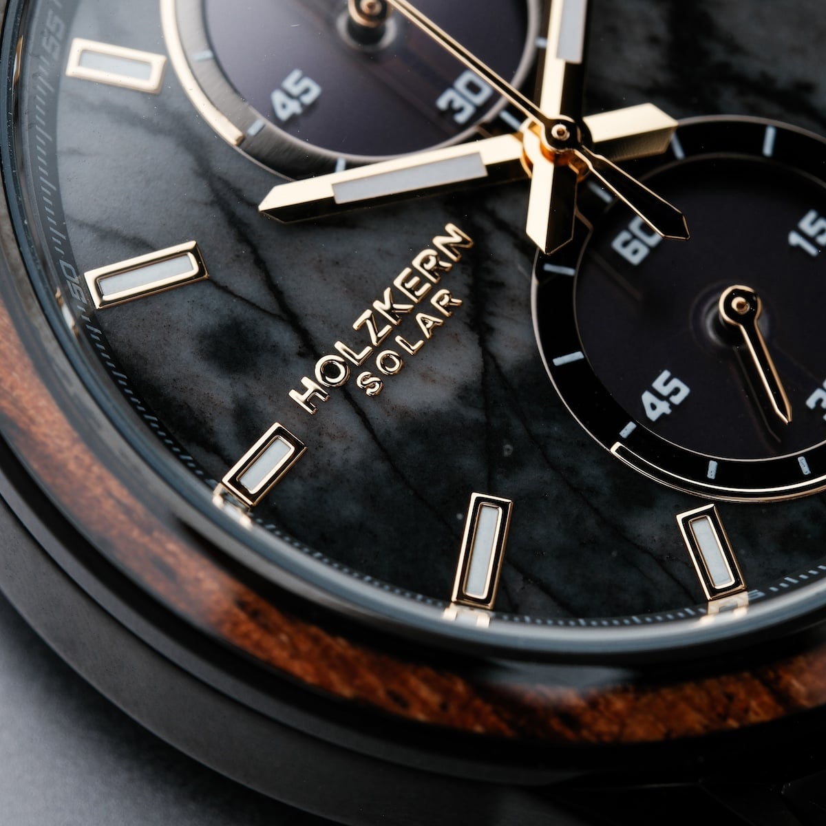 "Endowment" watch featuring a marble dial and zebrawood trim, offering a sophisticated and natural look.