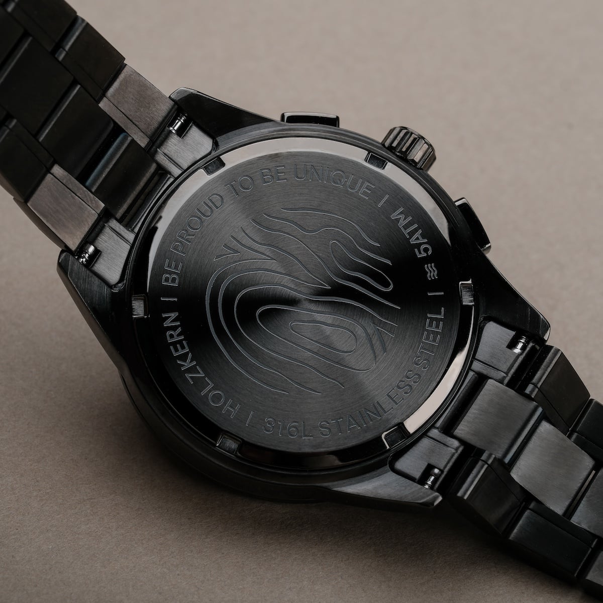 "Endowment" watch featuring a sleek stainless steel back and modern aesthetic.
