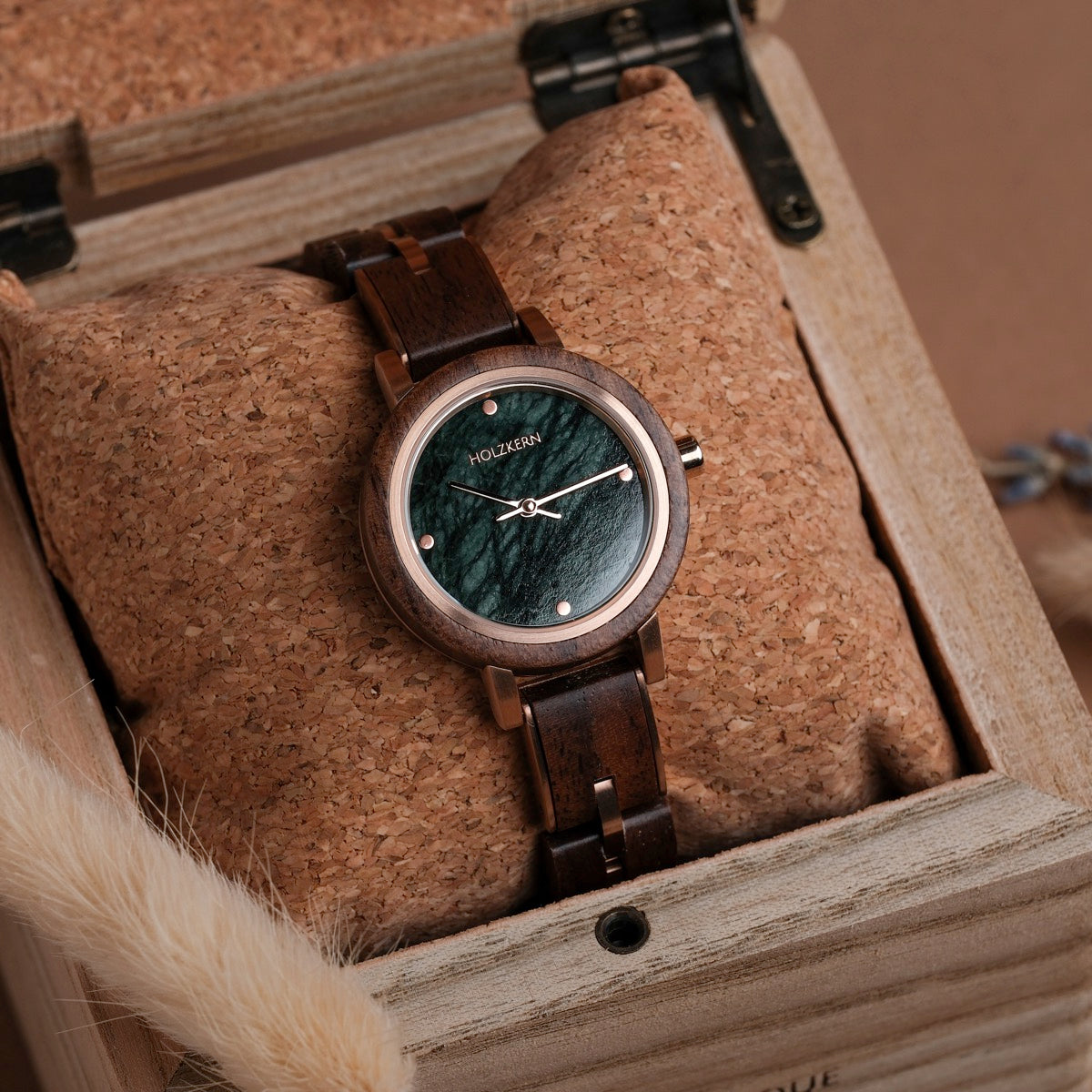"Euterpe" watch features a walnut case and marble dial, blending elegance with a natural aesthetic.