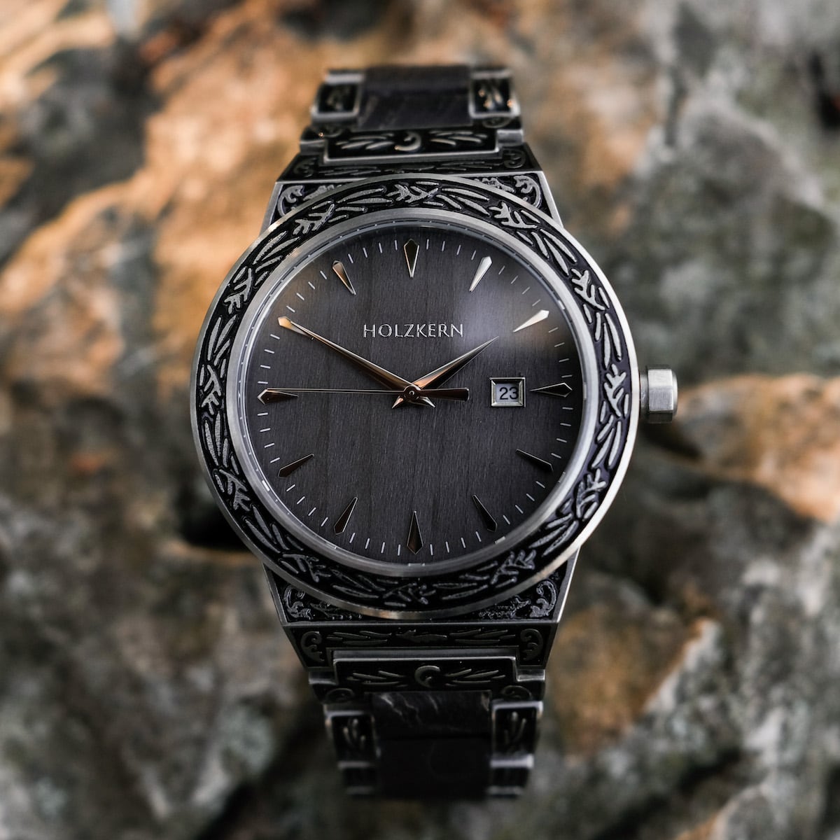 "Misir" watch with intricate design, featuring a dark dial and metallic accents for a sophisticated look.