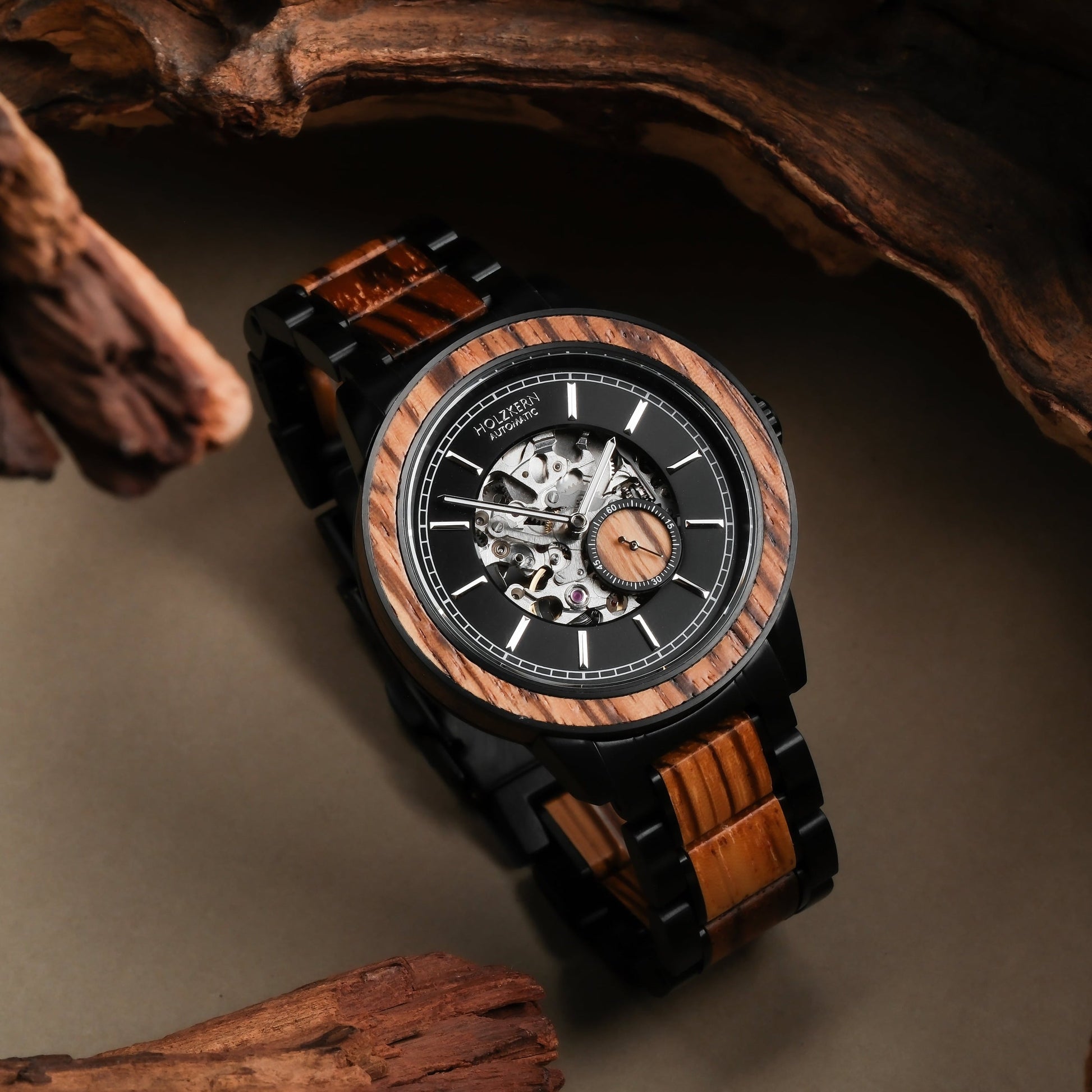 "San Juan" watch featuring zebrawood accents and a sleek mechanical style.