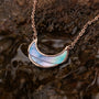 "Hue Necklace" necklace featuring blue nacre and rose gold on a delicate chain.