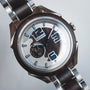 "Will" wood and metal watch with a modern analog design featuring blue accents.