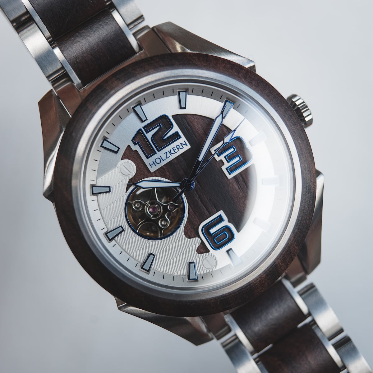 "Will" wood and metal watch with a modern analog design featuring blue accents.
