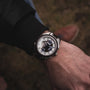 "Will" watch featuring a sleek design with a modern face and visible internal mechanics.